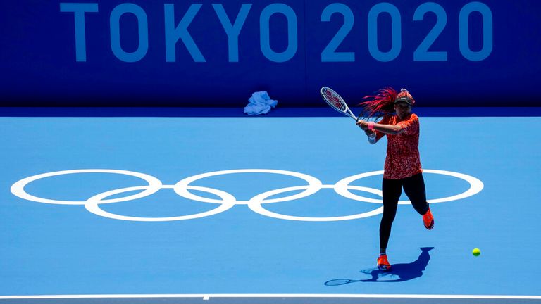 Naomi Osaka, of Japan, practices ahead of the 2020 Summer Olympics at Ariake Tennis Center, Monday, July 19, 2021, in Tokyo. (AP Photo/Kiichiro Sato)