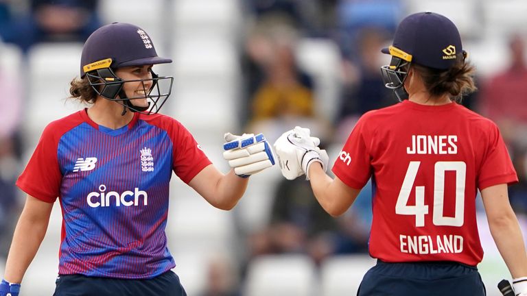 England's Nat Sciver and Amy Jones during the first Vitality IT20 match at The County Ground, Northampton. Picture date: Friday July 9, 2021.