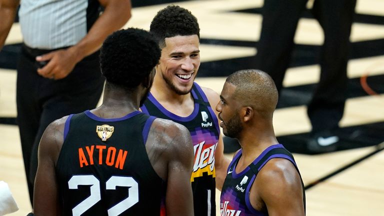 Deandre Ayton, Devin Booker and Chris Paul during Game 1 of the NBA Finals