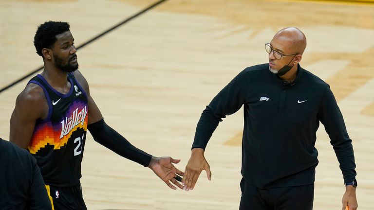 Phoenix Suns center Deandre Ayton, left, reacts with head coach Monty Williams during the first half of Game 2 of basketball&#39;s NBA Finals against the Milwaukee Bucks, Thursday, July 8, 2021, in Phoenix. (AP Photo/Ross D. Franklin)


