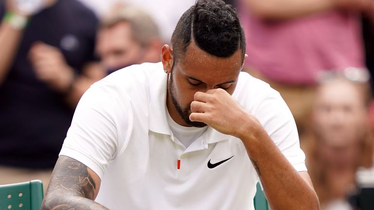 Nick Kyrgios reacts before retiring injured from his Gentlemen's Singles third round match against Felix Auger-Aliassime on day six of Wimbledon at The All England Lawn Tennis and Croquet Club, Wimbledon. Picture date: Saturday July 3, 2021.
