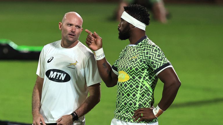 Springboks head coach Jacques Nienaber (left) and co have been forced to suspend training and place the squad in isolation after a positive Covid-19 result 