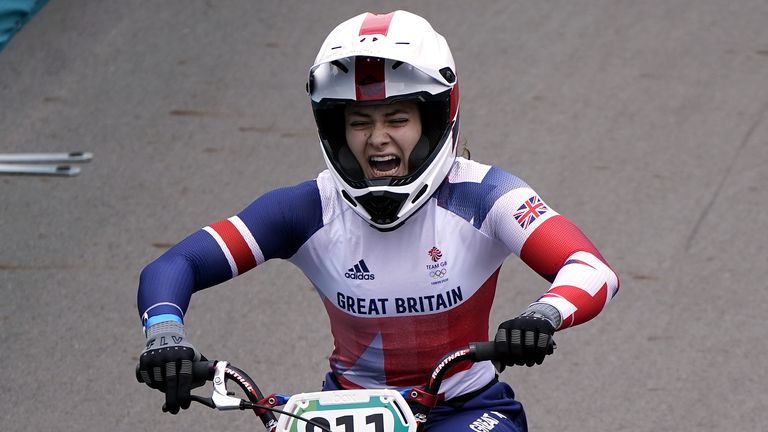 Bethany Shriever celebrates after winning gold for Team GB in the BMX cycling at Tokyo 2020.