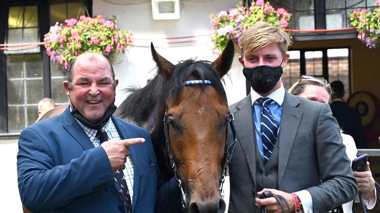 Harry Teal, right, with Oxted and trainer Roger after winning the July Cup at Newmarket last year