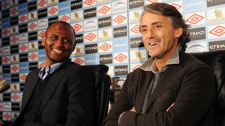 Patrick Vieira is unveiled as a Manchester City player in January 2010 alongside manager Roberto Mancini