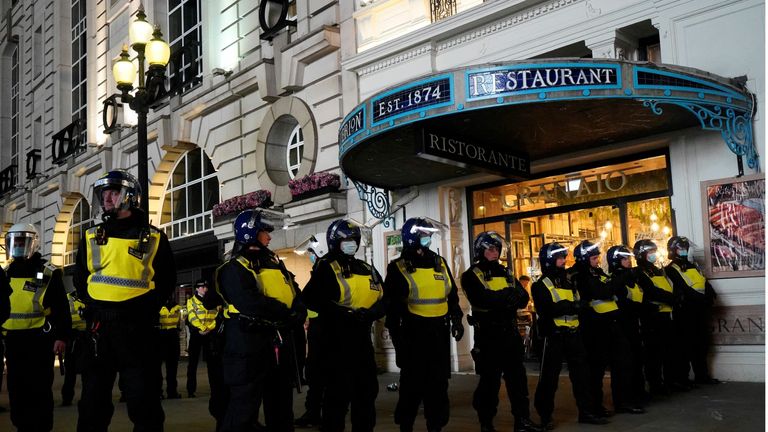 Riot police were deployed as England fans celebrated Wednesday's win over Denmark (Getty)
