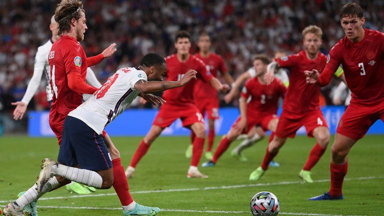 Raheem Sterling goes down to win England a penalty