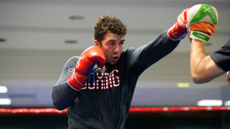 USA Boxing team member Richard Torrez Jr. spars with head coach Billy Walsh during a media day for the team in a gym located in a converted Macy...s Department store Monday, June 7, 2021, in Colorado Springs, Colo. (AP Photo/David Zalubowski)...................