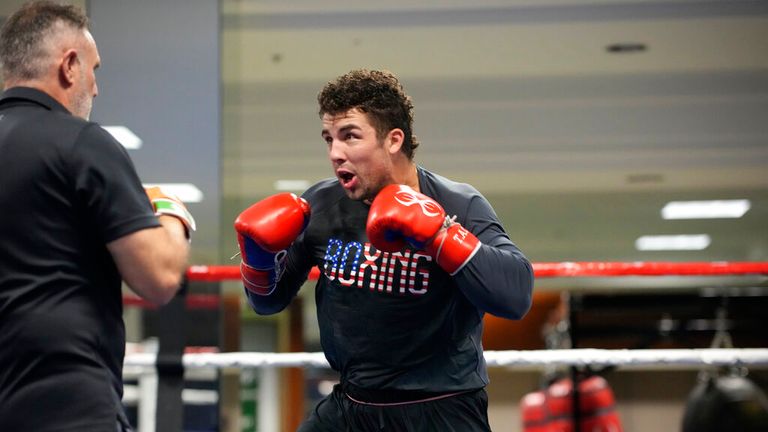 USA Boxing team member Richard Torrez Jr. spars with head coach Billy Walsh during a media day for the team in a gym located in a converted Macy...s Department store Monday, June 7, 2021, in Colorado Springs, Colo. (AP Photo/David Zalubowski)...................