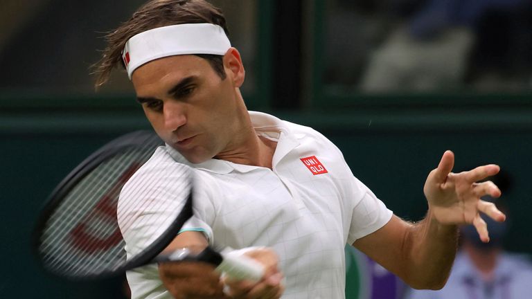Roger Federer of Switzerland hits a ball during the Men...s singles first round of the Championships, Wimbledon against Adrian Mannarino of France at the All England Lawn Tennis and Croquet Club in London, United Kingdom on June 29, 2021.Federerwon the game. ( The Yomiuri Shimbun via AP Images )