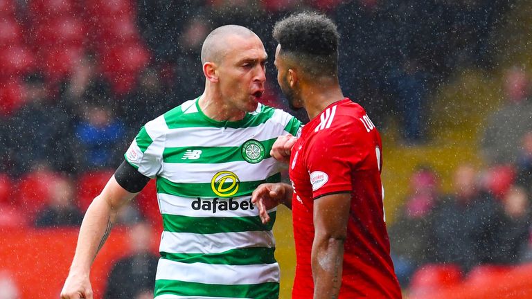 SNS - Scott Brown as a Celtic player, squaring up to Aberdeen's Shay Logan