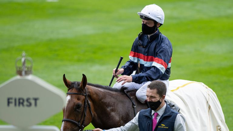 Oisin Murphy leads Sir Busker into the winner's enclosure at Ascot last year