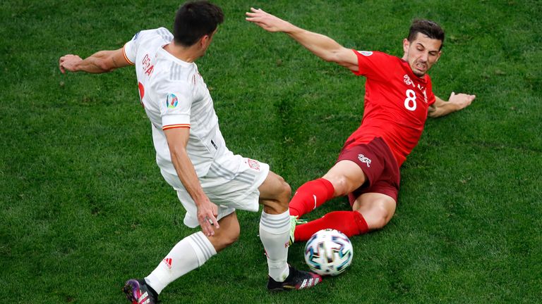 Switzerland's Remo Freuler was sent off for this challenge on Spain's Gerard Moreno