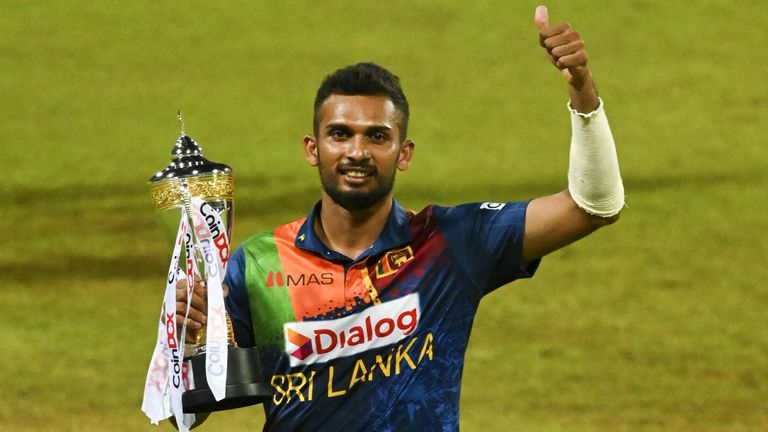Dasun Shanaka celebrates with the trophy after his side secured a T20 series win over India