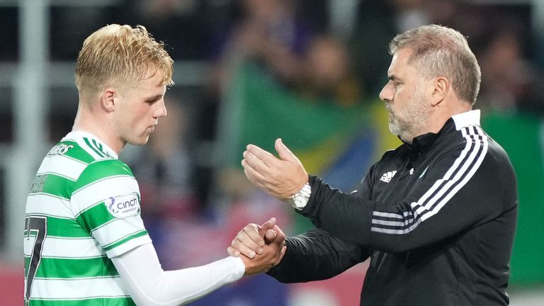 Celtic's Stephen Welsh is consoled by Ange Postecoglou