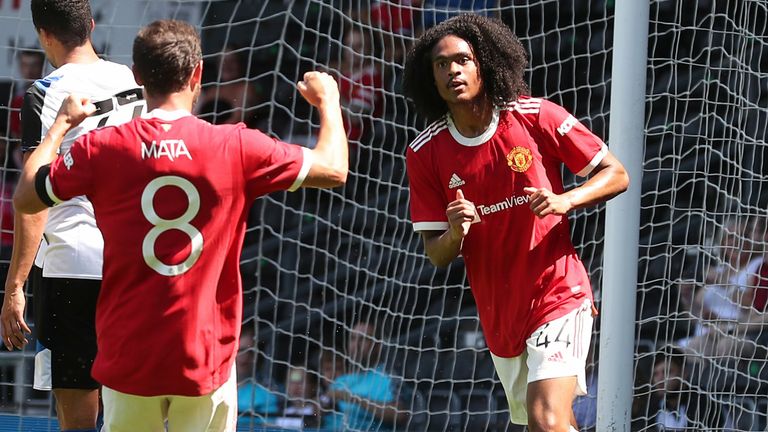 Tahith Chong celebrates after opening the scoring for Manchester United against Derby County 