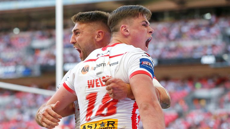 Picture by Ed Sykes/SWpix.com - 17/07/2021 - Rugby League - Betfred Challenge Cup Final - Castleford Tigers v St Helens - Wembley Stadium, London, England - St Helens' Tommy Makinson celebrates with Jack Welsby after scoring their third try