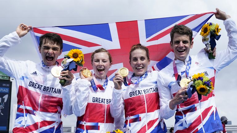 Britain&#39;s mixed triathlon team celebrate their gold medal on Saturday