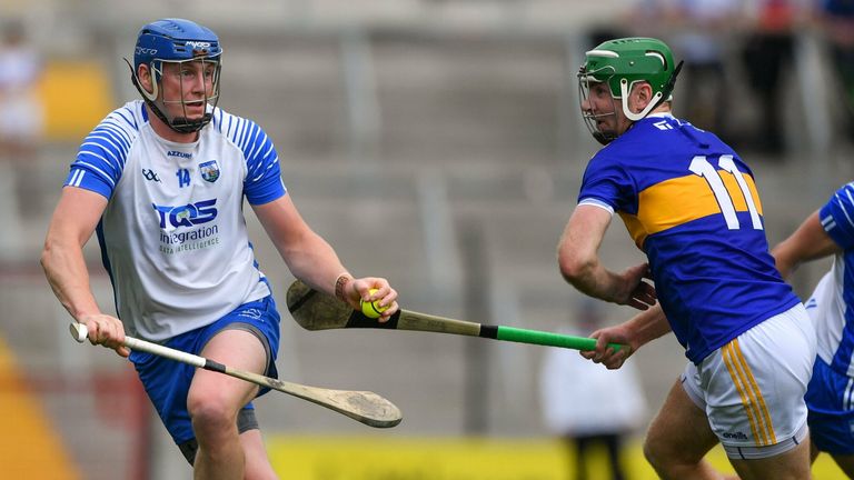 31 July 2021; Austin Gleeson of Waterford in action against Noel McGrath of Tipperary during the GAA Hurling All-Ireland Senior Championship Quarter-Final match between Tipperary and Waterford at Pairc Ui Chaoimh in Cork. Photo by Daire Brennan/Sportsfile
