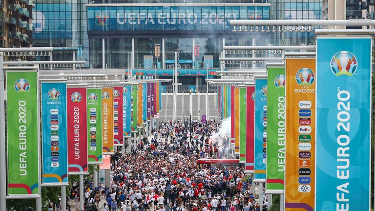 11 July 2021, United Kingdom, London: Football: European Championship, Italy - England, Final at Wembley Stadium. Numerous fans of England celebrate in front of the stadium in Wembley Park. Photo by: Christian Charisius/picture-alliance/dpa/AP Images