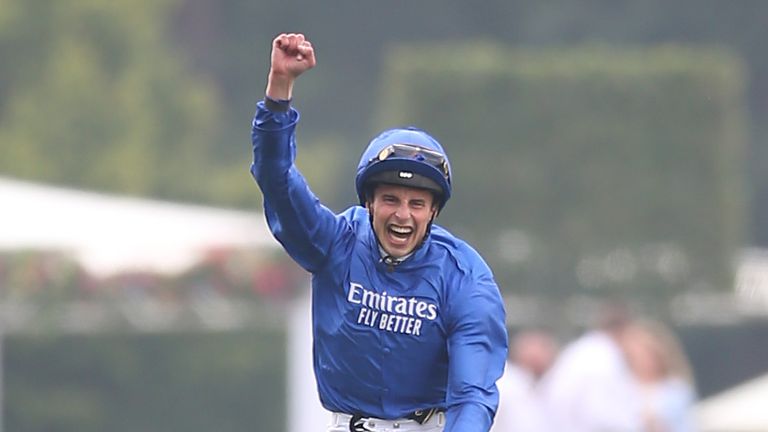 William Buick celebrates after Adayar's victory in the King George