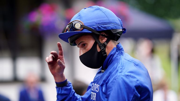 William Buick celebrates after victory on Royal Fleet at Newmarket