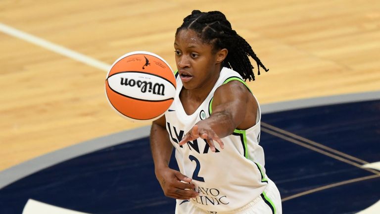 Minnesota Lynx guard Crystal Dangerfield (2) passes the ball against the Phoenix Mercury during a WNBA basketball game, Friday, May 14, 2021, in Minneapolis. (AP Photo/Hannah Foslien)


