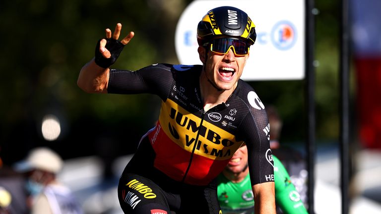 Wout Van Aert of Belgium celebrates winning Stage 21 
