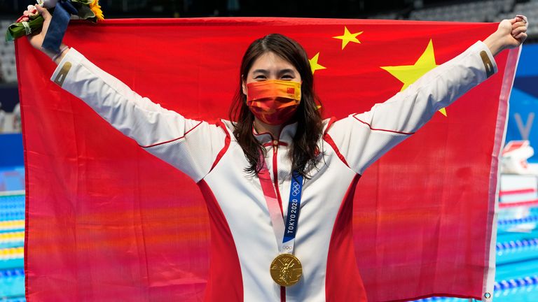 Zhang Yufei of China poses with the gold medal after winning the women's 200m butterfly final