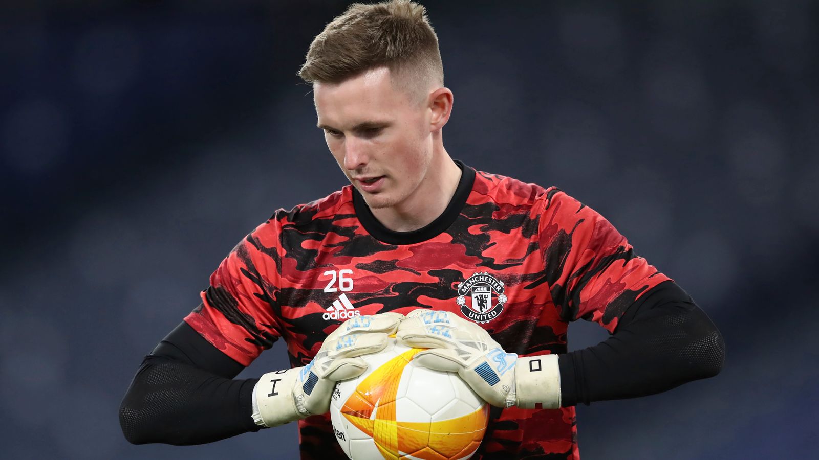 Dean Henderson will miss Manchester United's training camp in Scotland after con..