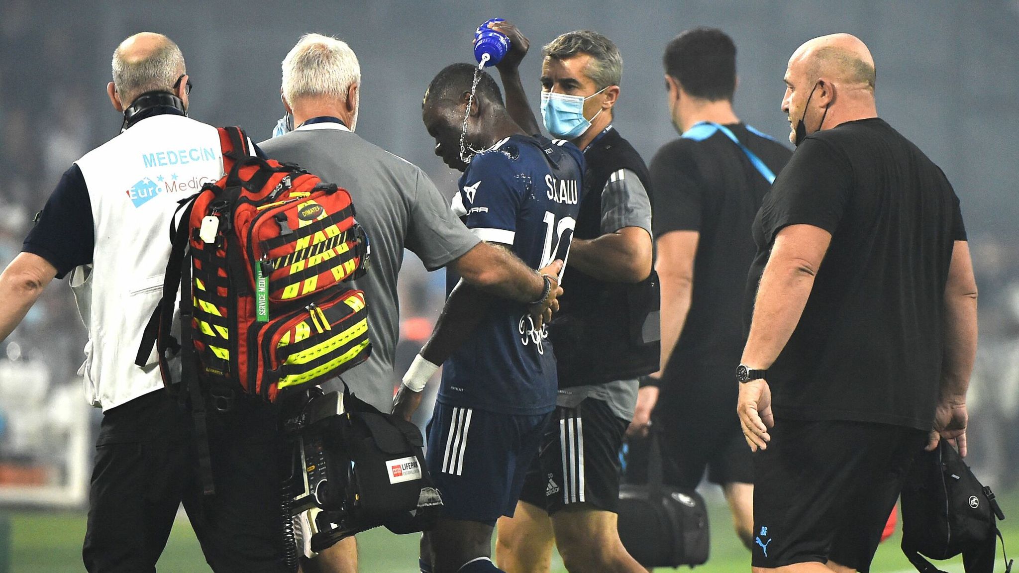 Samuel Kalu: Bordeaux striker collapses during Ligue 1 match against  Marseille before briefly returning to the pitch | Football News | Sky Sports