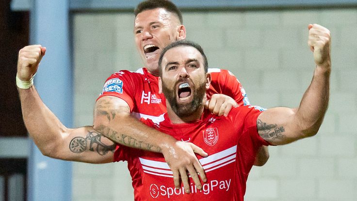 Picture by Allan McKenzie/SWpix.com - 13/08/2021 - Rugby League - Betfred Super League Round 19 - Hull KR v Wigan Warriors - Hull College Craven Park, Hull, England - Hull KR's Kane Linnett celebrates his try against Wigan with Shaun Kenny-Dowall.