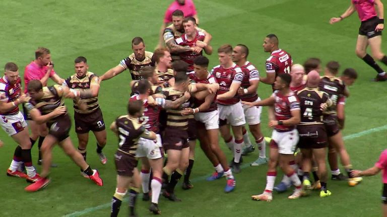 Watch the brawl which saw Ashworth and Singleton both sent from the field