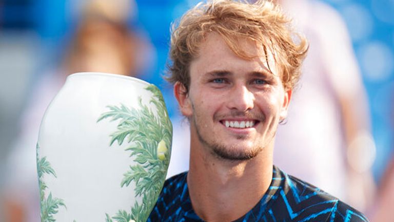 Alexander Zverev holds the Rookwood Cup after winning the Western & Southern Open title on Sunday (Photo by Shelley Lipton/Icon Sportswire) (Icon Sportswire via AP Images)