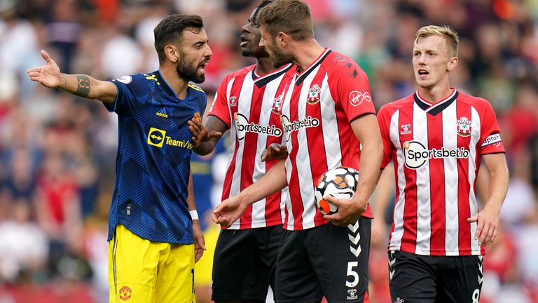 Manchester United's Bruno Fernandes (left) and Southampton's Jack Stephens (second right) clash during the Premier League match at St Mary's 