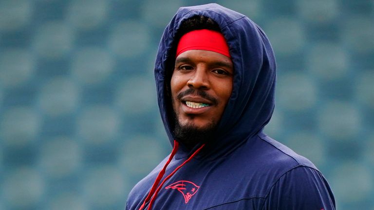 New England Patriots' Cam Newton walks on the field before a preseason NFL football game Philadelphia Eagles on Thursday, Aug. 19, 2021, in Philadelphia. (AP Photo/Matt Rourke)