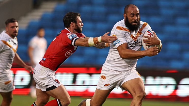 Sam Kasiano runs through to score a try