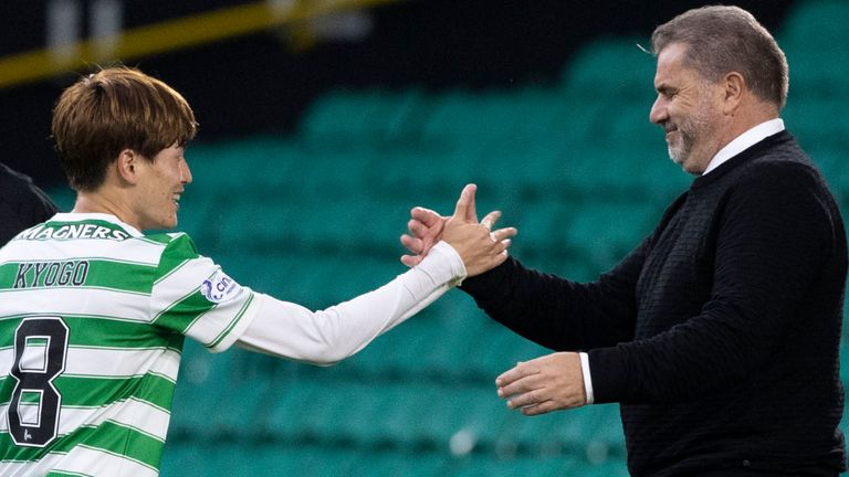 GLASGOW, SCOTLAND - AUGUST 08: Celtic&#39;s Kyogo Furuhashi (L) and manager Ange Postecoglou during a cinch Premiership match between Celtic and Dundee at Celtic Park, on August 08, 2021, in Glasgow, Scotland. (Photo by Craig Williamson / SNS Group)