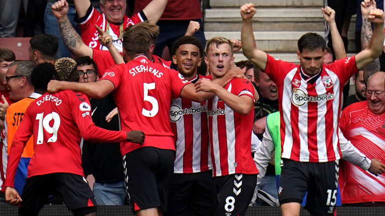 Che Adams celebrates with team-mates after giving Southampton the lead against Manchester United