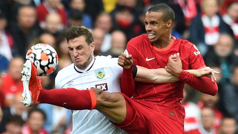Chris Wood and Joel Matip battle for the ball - but Jurgen Klopp was unhappy with some challenges in the game between Liverpool and Burnley