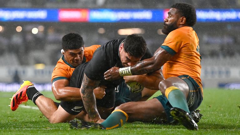 The All Blacks retained the Bledisloe Cup after running in eight tries and achieving their highest-ever score against the Wallabies at home 
