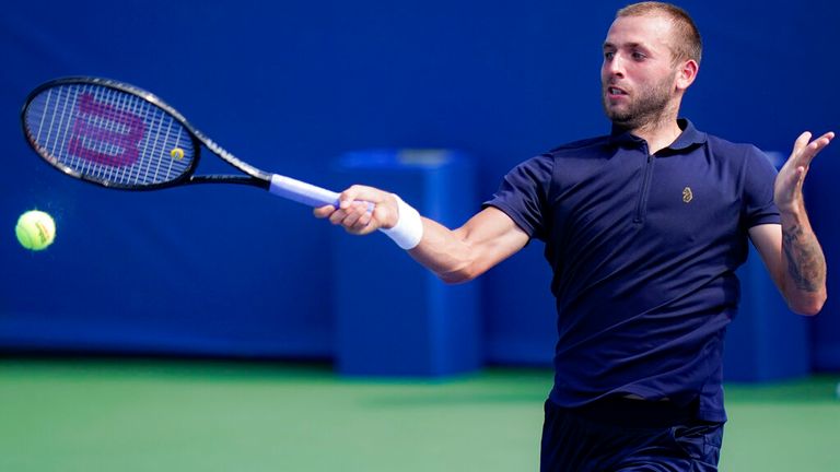 Dan Evans, of the United Kingdom, returns to Andrey Rublev, of Russia, at the Western & Southern Open tennis tournament, Sunday, Aug. 23, 2020, in New York. (AP Photo/Frank Franklin II)