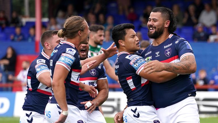 Wakefield Trinity v Warrington Wolves - Betfred Super League - Mobile Rocket Stadium
Wakefield Trinity's David Fifita (right) celebrates scoring their side's second try of the game with team-mates during the Betfred Super League match at the Mobile Rocket Stadium, Wakefield. Picture date: Sunday August 15, 2021.