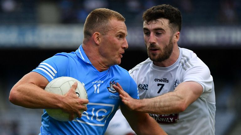 Ciarán Kilkenny of Dublin is tackled by Kevin Flynn of Kildare