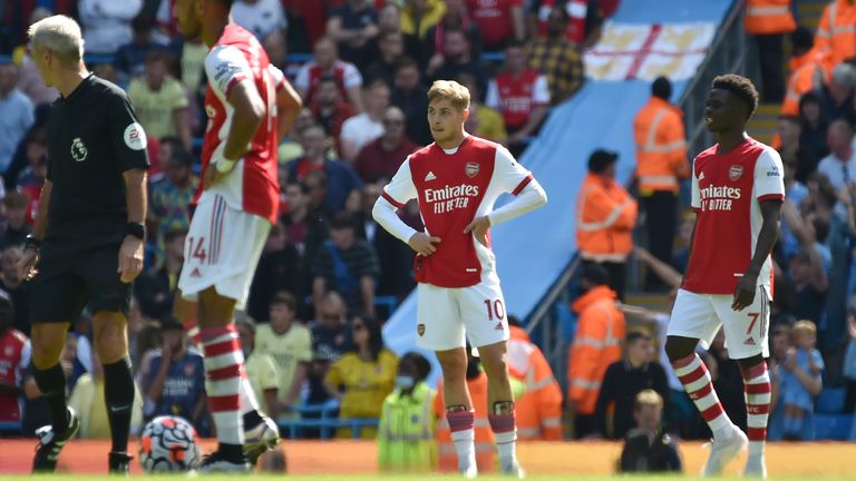 Arsenal's Emile Smith Rowe, and Bukayo Saka look dejected as the team struggles at Man City