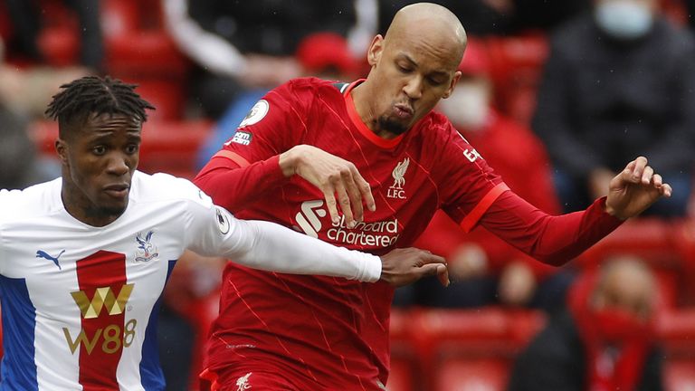 Liverpool midfielder Fabinho challenges Crystal Palace forward Wilfred Zaha (PA)