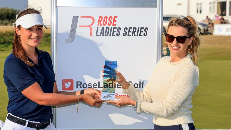 Jae Bowers (left) presented with the trophy by Kate Rose (right) after winning the Rose Ladies Series event at Royal Birkdale 