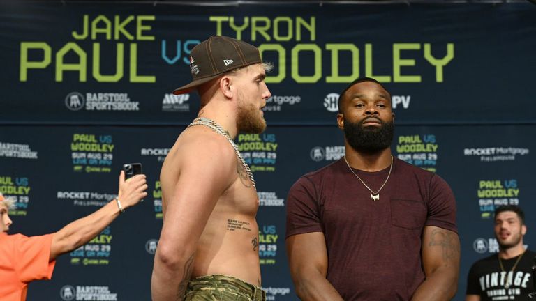  Jake Paul and Tyron Woodley pose during a press conference at the Hilton Cleveland Downtown prior to their August 29 fight on August 26, 2021 in Cleveland, Ohio. (Photo by Jason Miller/Getty Images)