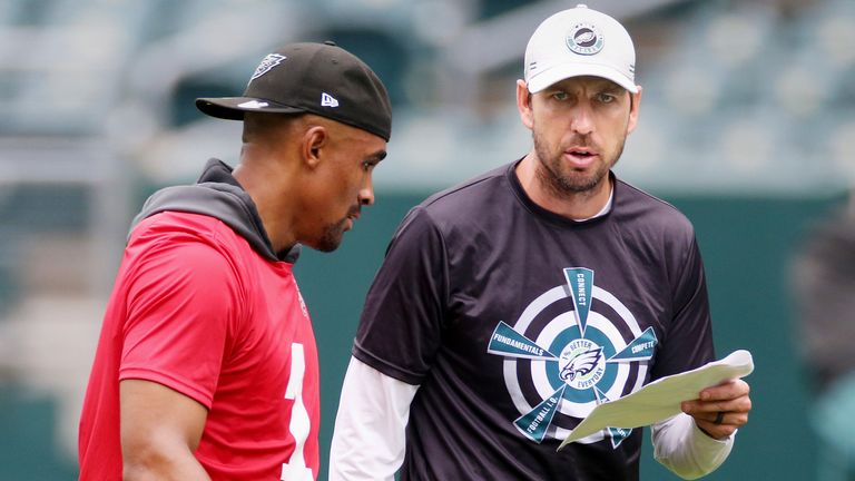 Eagles quarterback Jalen Hurts gets some feedback from offensive coordinator Shane Steichen during practice (AP)