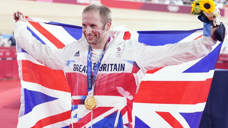 Great Britain's Jason Kenny celebrates with the gold medal in the Men's Keirin Final to become the most decorated British Olympian of all time. 